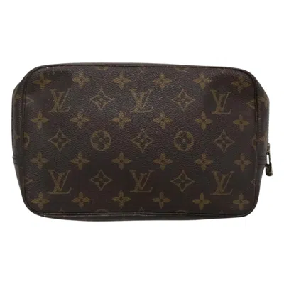 Pre-owned Louis Vuitton Truth Toilette 23 Brown Canvas Clutch Bag ()