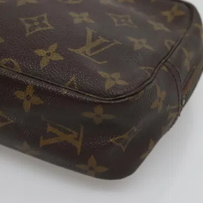 Pre-owned Louis Vuitton Truth Toilette 23 Brown Canvas Clutch Bag ()