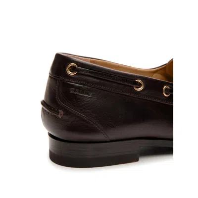 Bally Pointed Toe Flats With Gold-tone Lace-up Detailing In Black