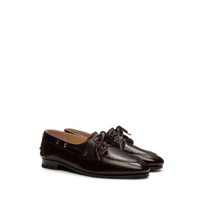 Bally Pointed Toe Flats With Gold-tone Lace-up Detailing In Black