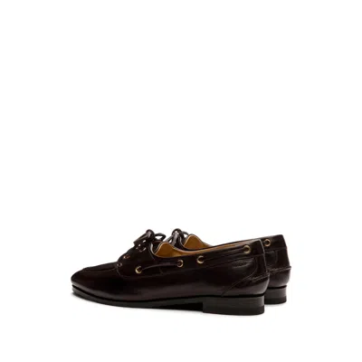Bally Pointed Toe Flats With Gold-tone Lace-up Detailing In Black