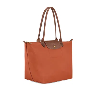 Longchamp Le Pilage Original Red Medium Tote Bag With Two Top Handles And Embossed Logo On The Front In Canvas
