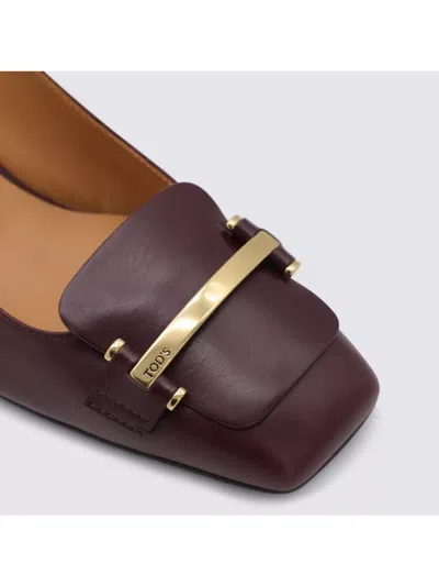 Tod's Chunky Heel Buckle Square Toe Pumps