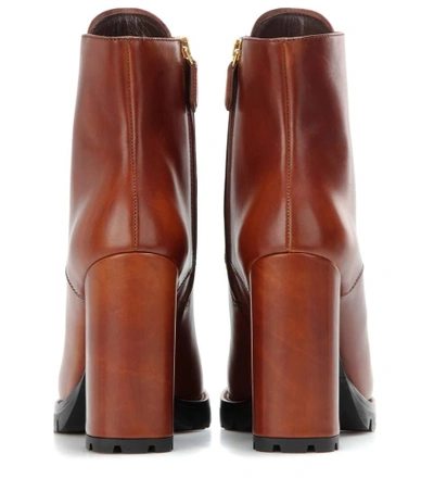 Shop Prada Leather Ankle Boots In Lruciato