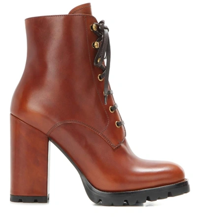 Shop Prada Leather Ankle Boots In Lruciato