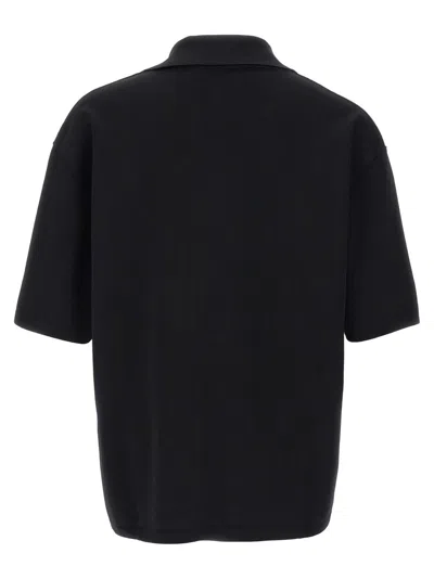 Ami Alexandre Mattiussi Ami V-neck Polo Shirt With Oversized Fit In Black