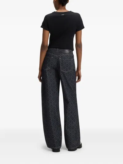 Hugo Boss Monogram-print Jeans In Black
