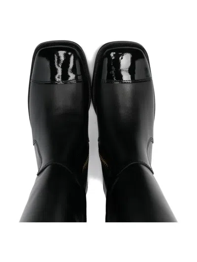 Balmain Studded Leather Boots In Black