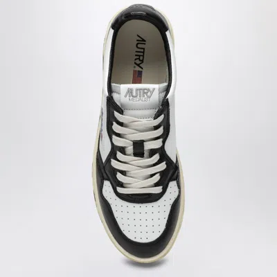 Autry Low-top Sneakers With Textured And Smooth Leather Design In White