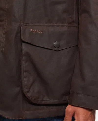 Barbour Waxed Jacket With Elbow Patches And High Neck In Brown