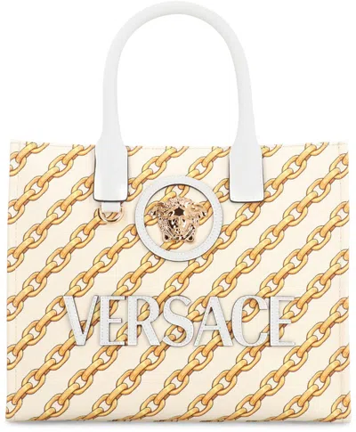 Versace Printed Canvas Small Chain Stripes La Medusa Shopping Bag In Gold