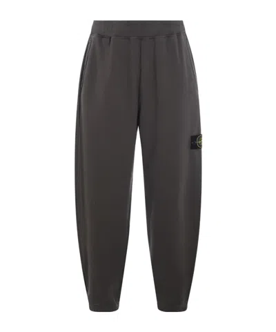 Stone Island Comfortable Trousers With Elastic Waistband And Side Pockets In Gray
