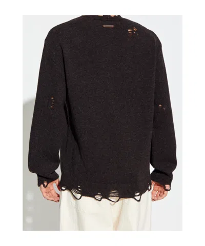 Moschino Distressed Ribbed Sweater With Cuffs And Hem In Black