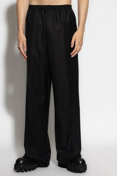 Moschino Elasticated-waist Gold-button Trousers In Black