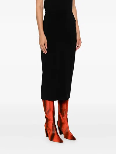 Norma Kamali Rear-vent Midi Skirt In Black