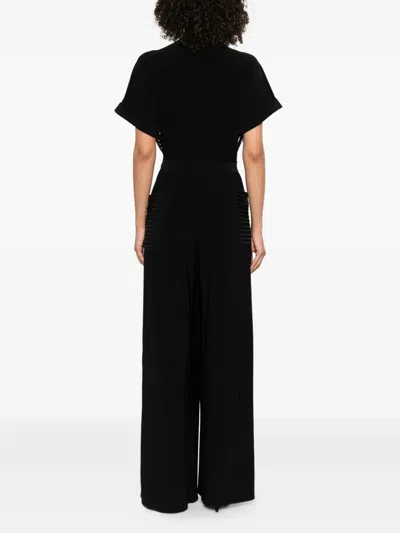 Norma Kamali Geralyn Belted Paneled Jersey And Mesh Jumpsuit In Black