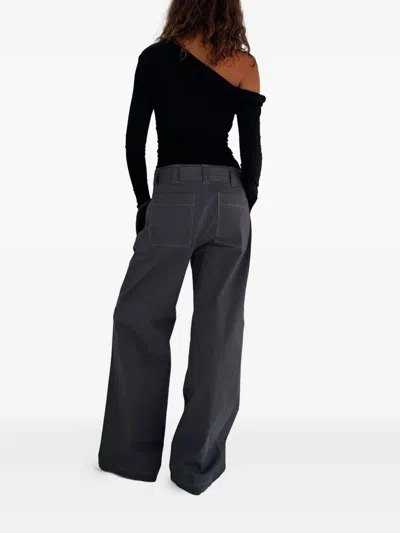 Paris Georgia Elemental Manahou Asymmetric Off-shoulder Top In Black