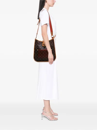 Pre-owned Louis Vuitton 2008 Monogram Musette Perforated Crossbody Bag In Brown