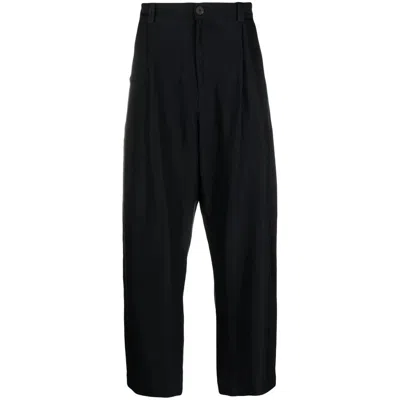 Studio Nicholson Tuck Wool Trousers In Black