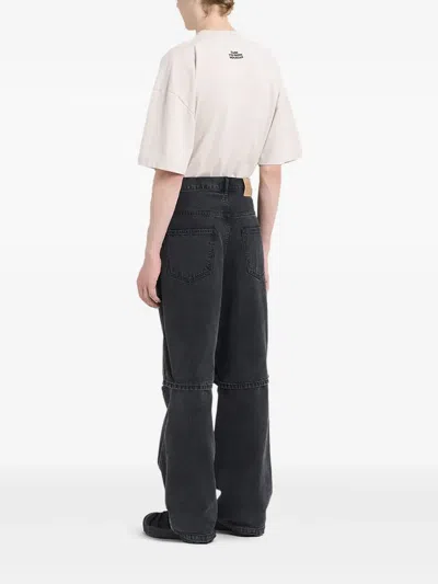 Etudes Studio Layered Knee-detailing Loose-fit Jeans In Black