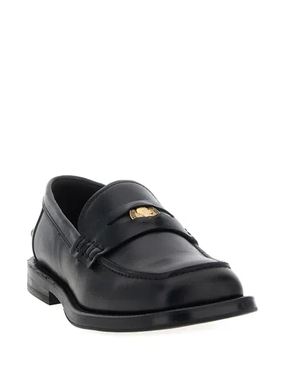 Moschino Strap Penny Round Toe Loafers In Black