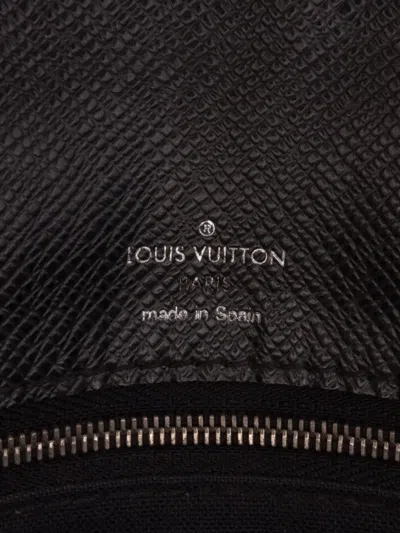 Pre-owned Louis Vuitton 2012 Taiga Belaia Clutch Bag In Black
