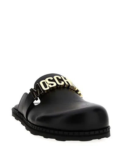 Moschino Logo-plaque Leather Mules In Black