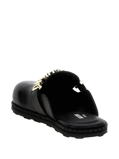 Moschino Logo-plaque Leather Mules In Black