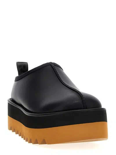 Stella Mccartney 'sneak-elyse' Black Mules With Open Rear