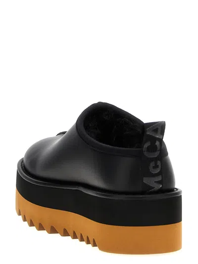 Stella Mccartney 'sneak-elyse' Black Mules With Open Rear