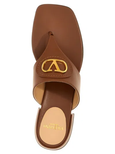 Valentino Garavani Women Caramel Leather Vlogo Thong