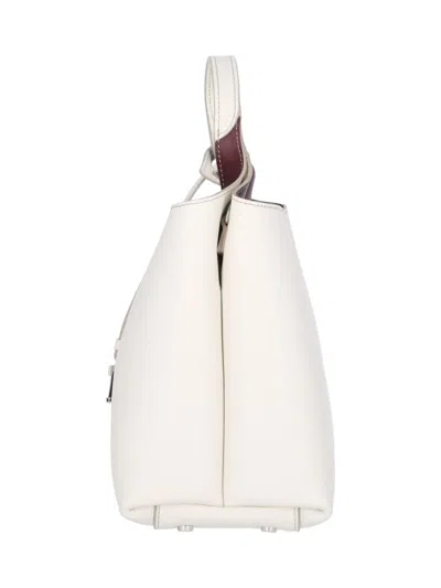 Tod's Textured White Leather Handbag With Silver Charm