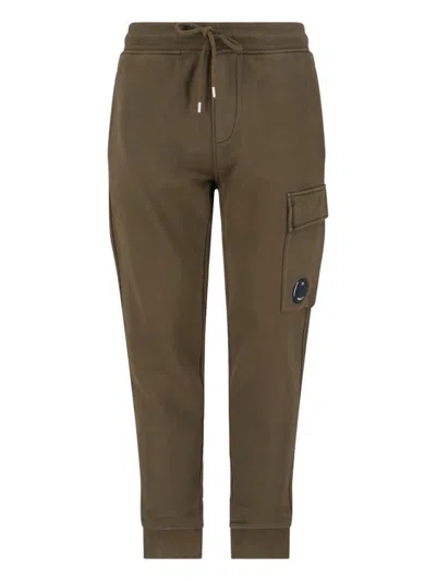 C.p. Company Cargo Pocket Drawstring Waist Ribbed Cuffs Trousers In Brown