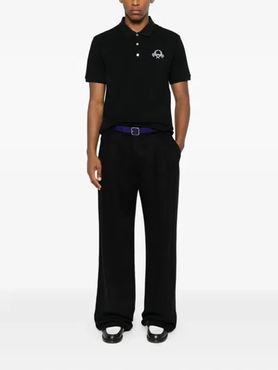 Moschino Logo-embroidered Polo Shirt In Black