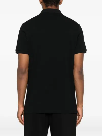 Moschino Logo-embroidered Polo Shirt In Black