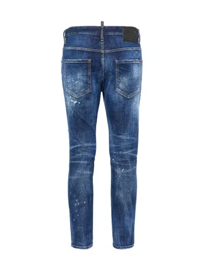 Dsquared2 Blue Jeans With Logo Patch On The Rear And All-over Paint-splatter Print Effect In Denim Man In Blue