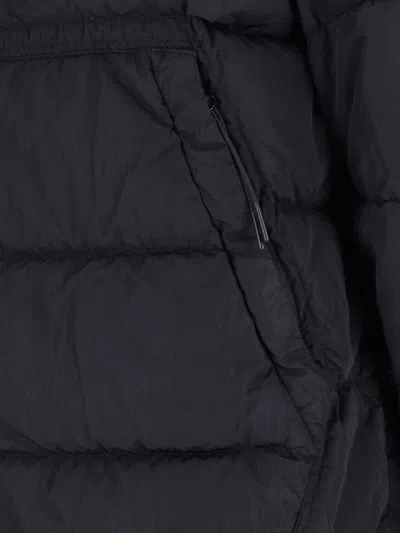 C.p. Company Blue Down Jacket With Fixed Hood And Logo Plaque On The Sleeve In Tech Fabric Man