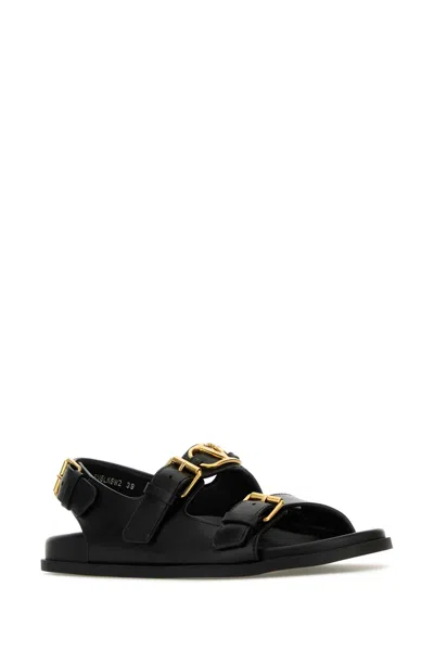 Valentino Leather Sandals With Flat Sole And Gold-tone Hardware In Black