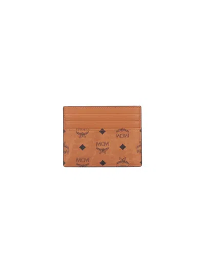 Mcm Brown Wallet With Embossed Pattern In Brown