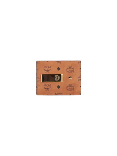 Mcm Brown Wallet With Embossed Pattern In Brown