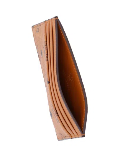 Mcm Brown Wallet With Embossed Pattern In Brown