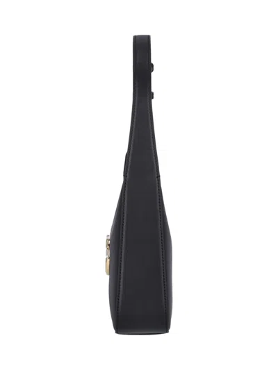 Dolce & Gabbana Curved Black Bag With Gold Logo Accents In Black