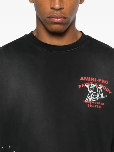 Amiri Short-sleeve T-shirt With Vintage Graphic And Distressed Finish In Black
