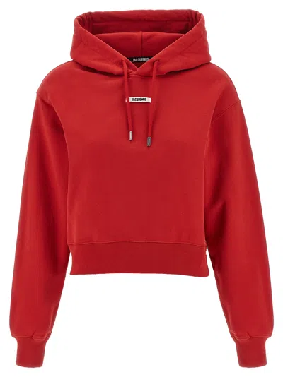 Jacquemus Cropped Hooded Drawstring Top In Red