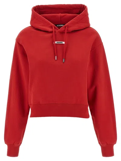 Jacquemus Cropped Hooded Drawstring Top In Red