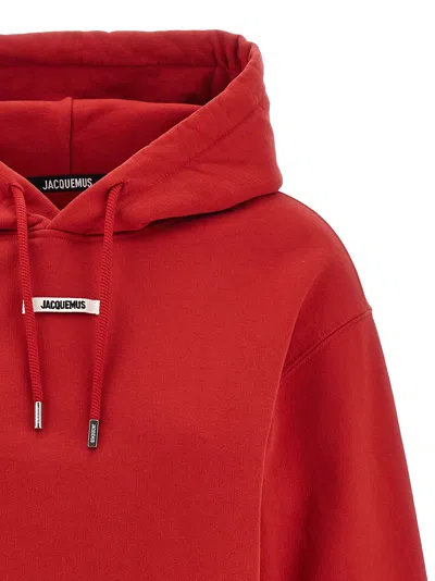 Jacquemus Cropped Hooded Drawstring Top In Red