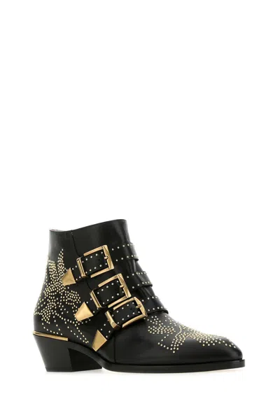 Chloé Black Calf Leather Bos Taurus Lace-up Boots In Animal Print