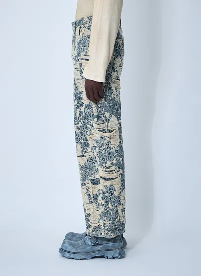 Acne Studios 1981 Distressed Monogram Jeans In Blue