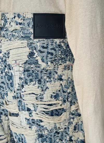 Acne Studios 1981 Distressed Monogram Jeans In Blue