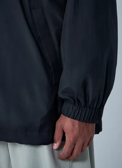 Balenciaga Hooded Raincoat With Drawstring And Pockets In Black